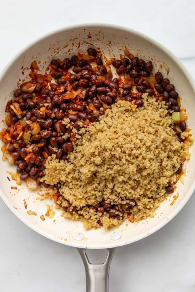 black beans and quinoa in a white pan