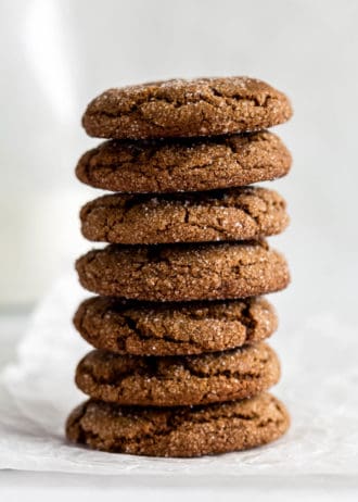 a stack of ginger molasses cookies