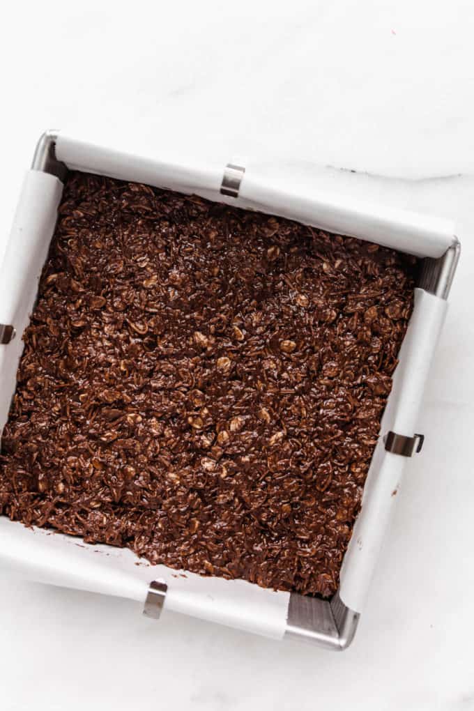 chocolate coconut bars batter in an 8x8 inch pan