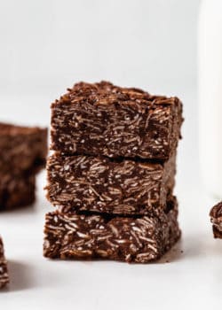 a stack of three chocolate coconut bars