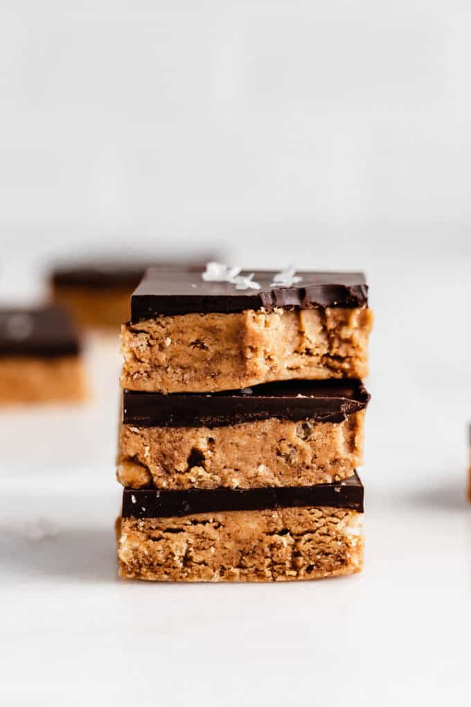 a stack of three peanut butter protein bars