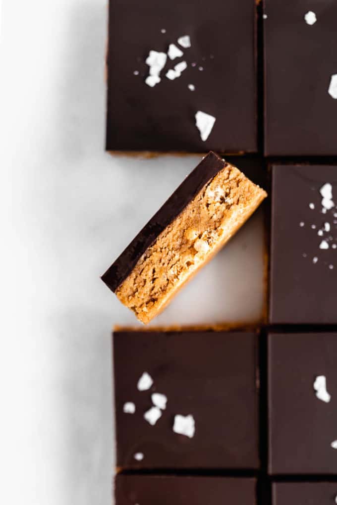 a peanut butter protein bar topped with dark chocolate