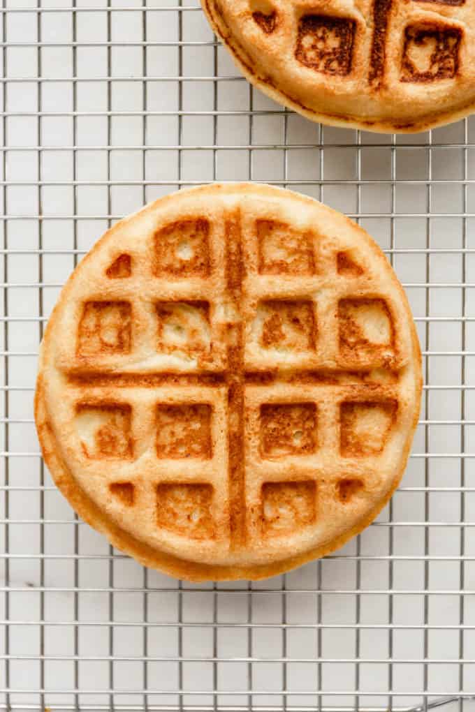 An almond flour waffle on a cooling rack
