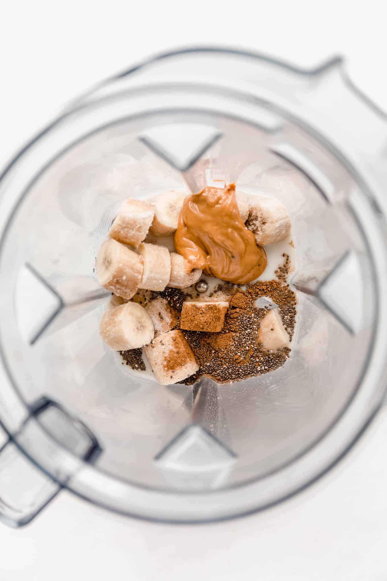 bananas, peanut butter and chia seeds in a blender