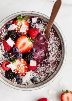 An acai bowl topped with berries
