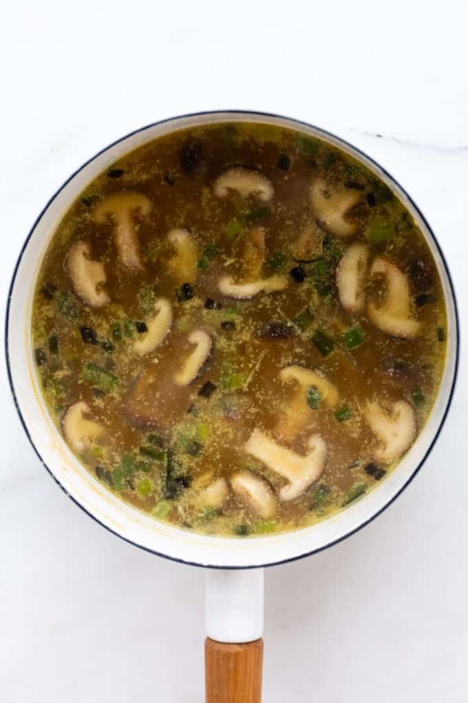 miso ramen soup in a white pot