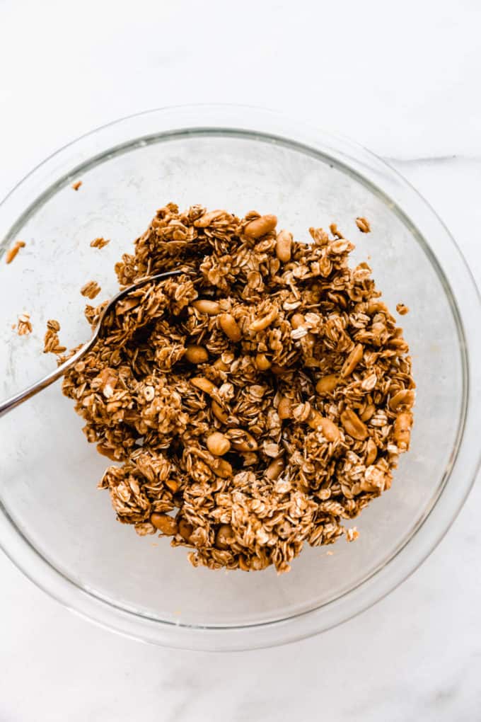 unbaked peanut butter granola in a mixing bowl