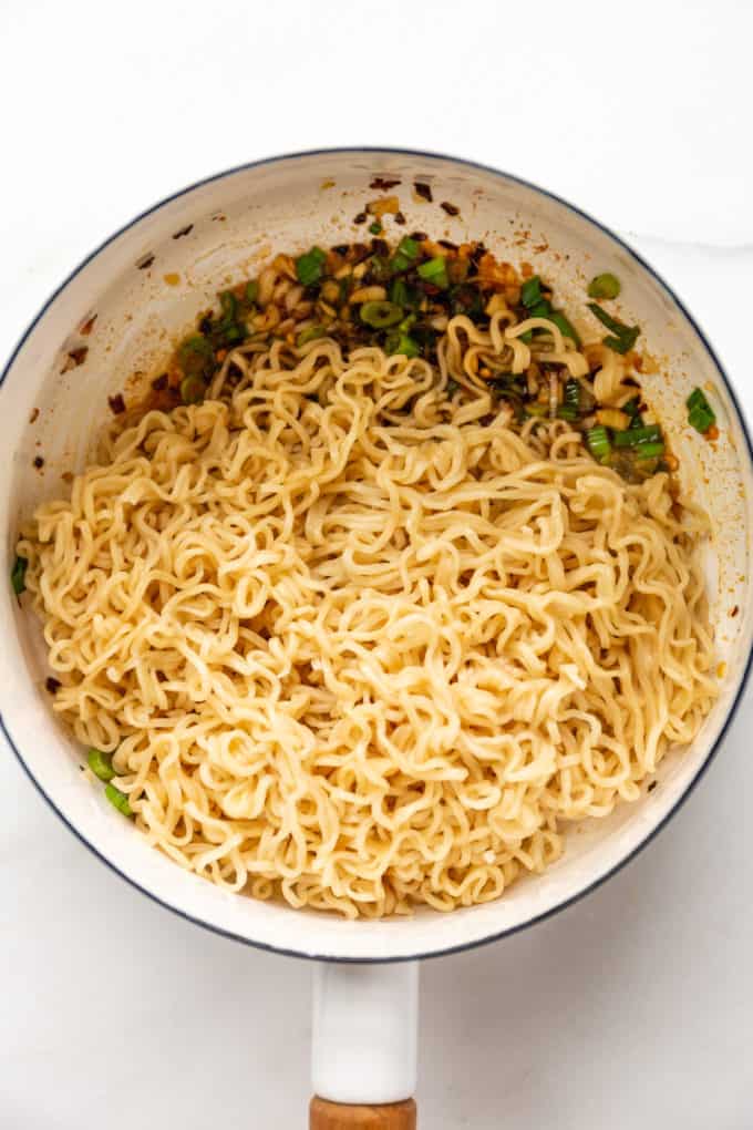 Ramen noodles in a white pot