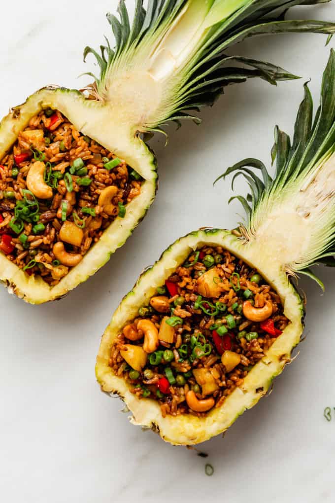 pineapple fried rice in two pineapple bowls