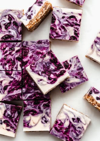 vegan blueberry cheesecake cut into squares