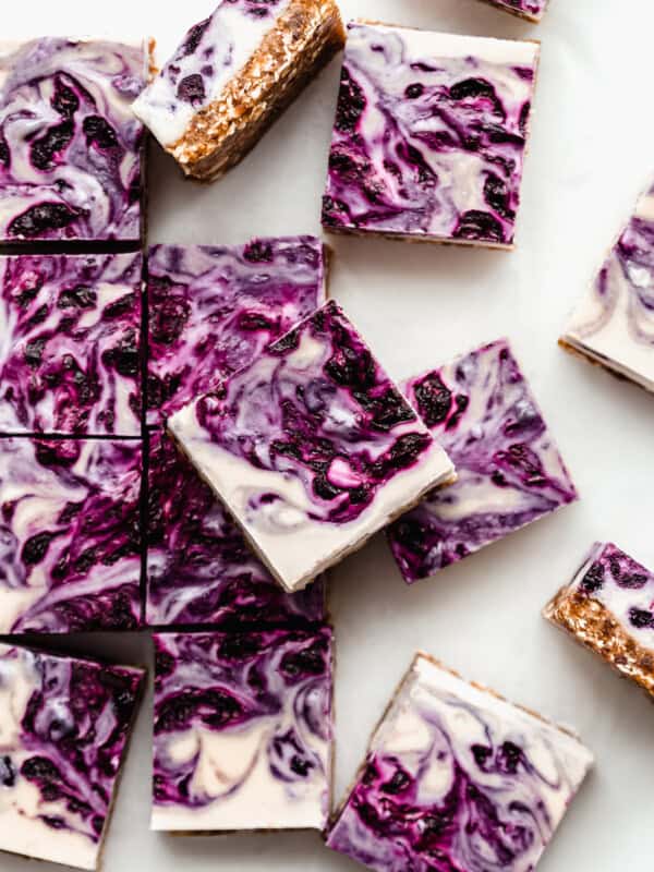 vegan blueberry cheesecake cut into squares
