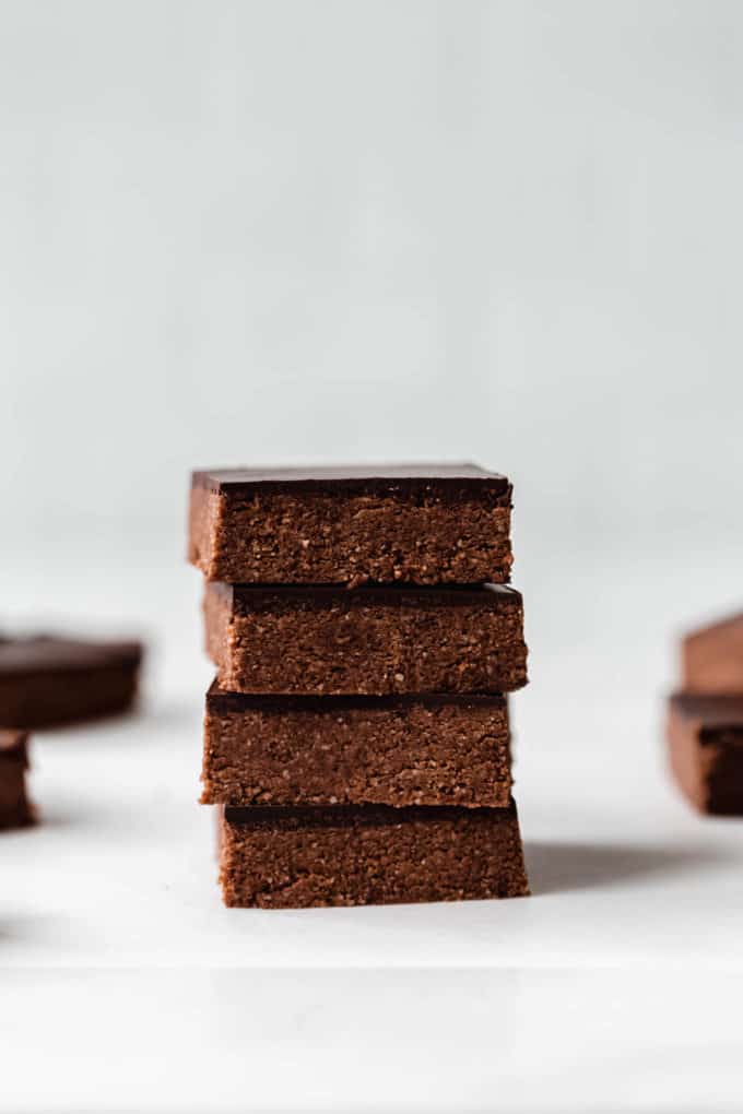 a stack of four chocolate protein bars