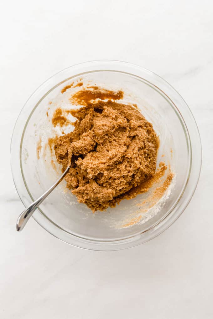 vegan peanut butter cookie dough in a clear mixing bowl