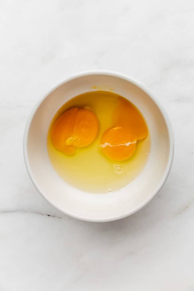 two eggs in a white bowl