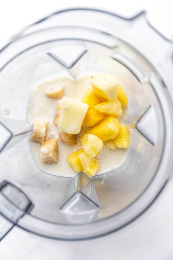 pineapple, banana and coconut milk in a blender
