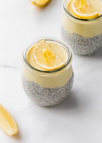lemon chia pudding in two small cubes with lemons on top