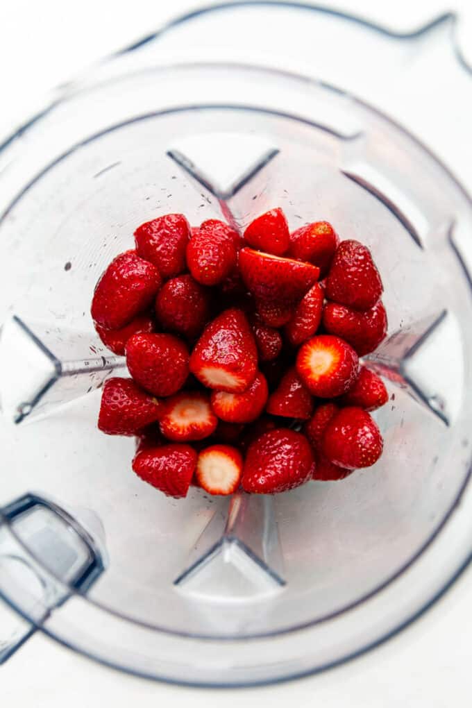 strawberries in a blender container