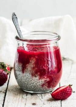 a jar of chia pudding with strawberry rhubarb compote