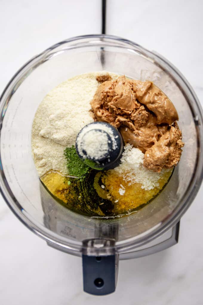 almond flour, matcha, honey, coconut and cashew butter in a food processor