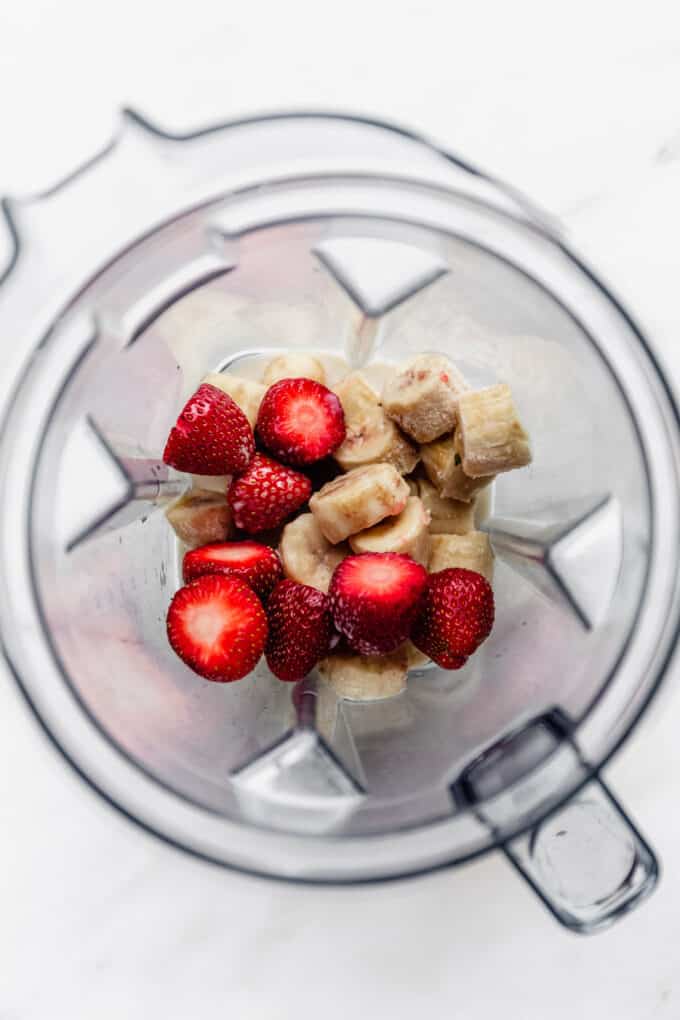 strawberries and bananas in a blender
