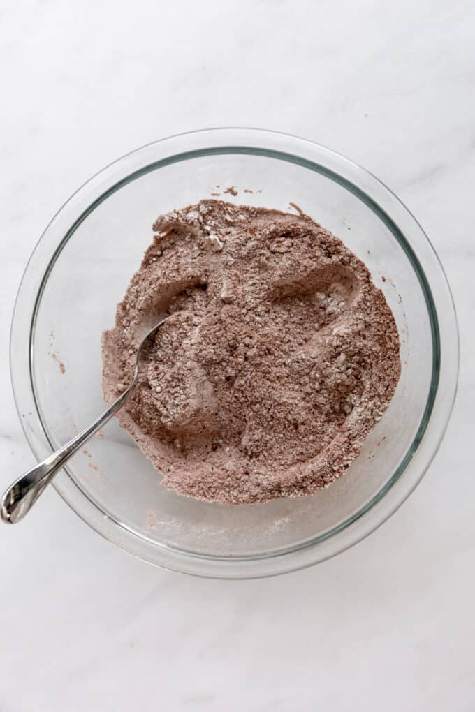 flour and cocoa powder mixed together in a clear bowl