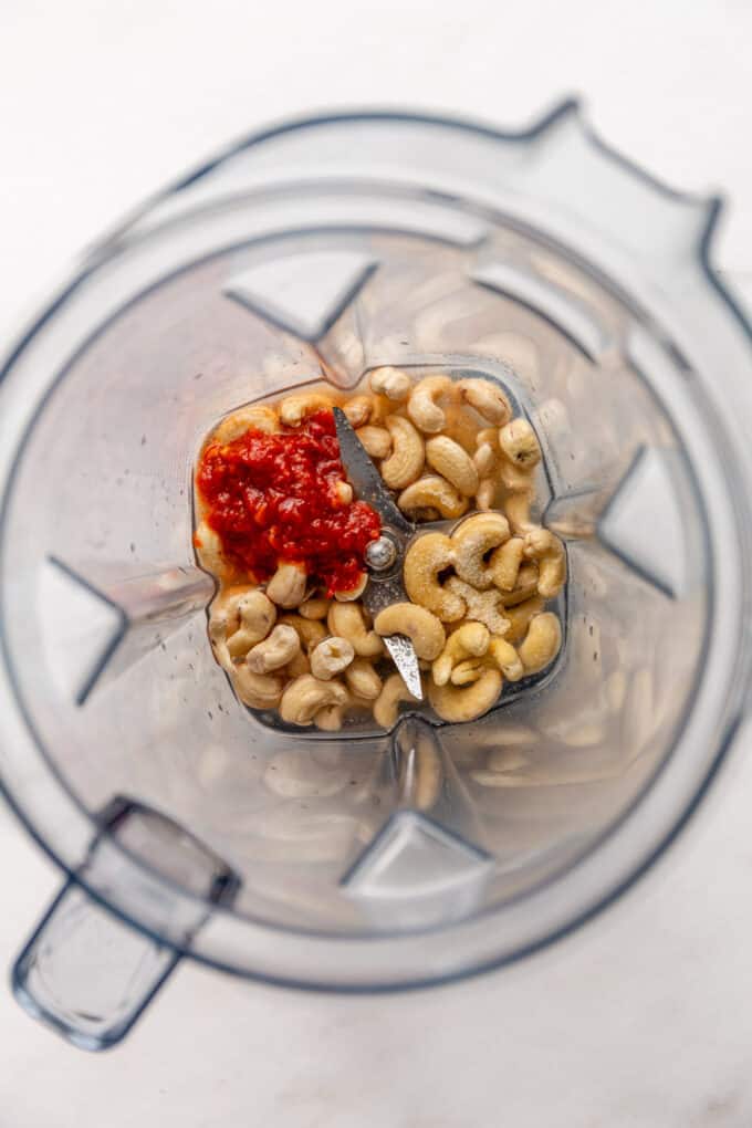 cashews, chipotle and seasoning in a blender container