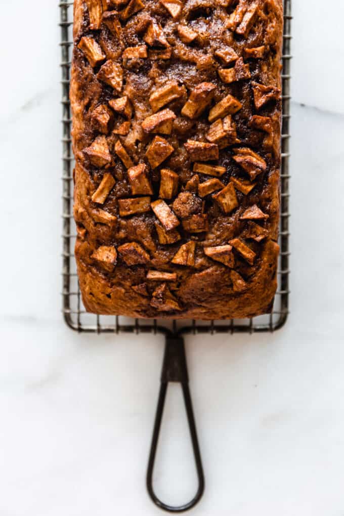 cinnamon apple bread on a cooling rack