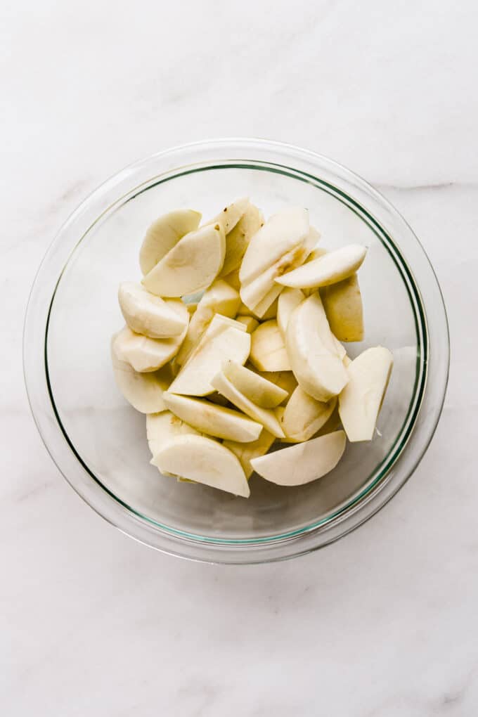 sliced apples in a clear bowl
