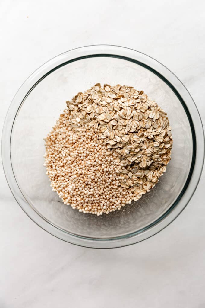 oats and puffed quinoa in a clear bowl