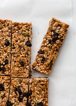 sliced homemade granola bars on parchment paper