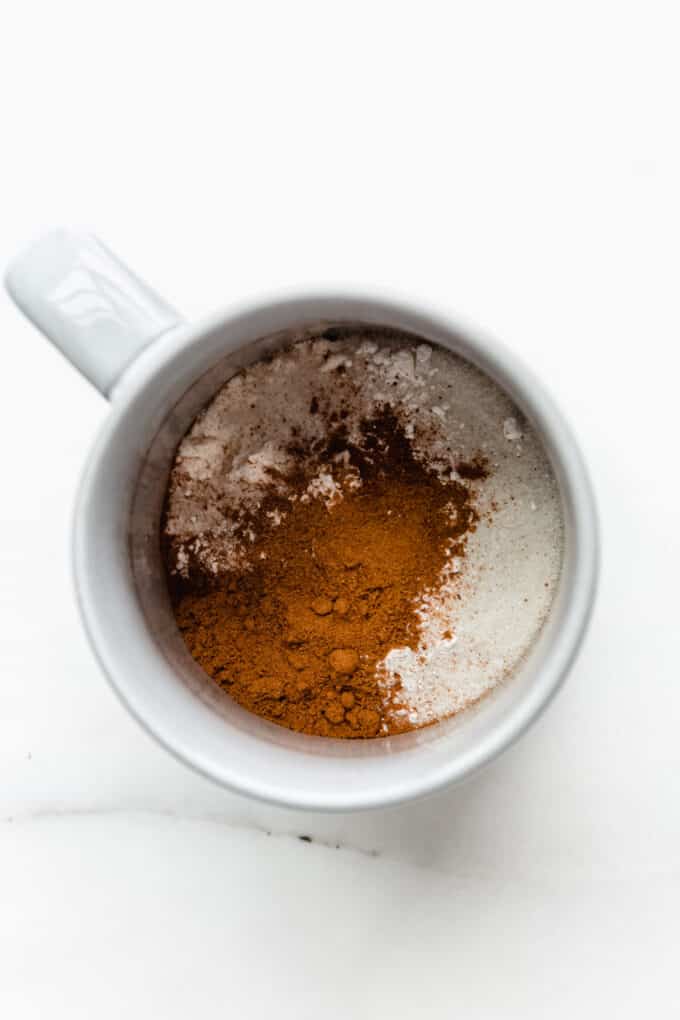 sugar, spices and flour in a mug