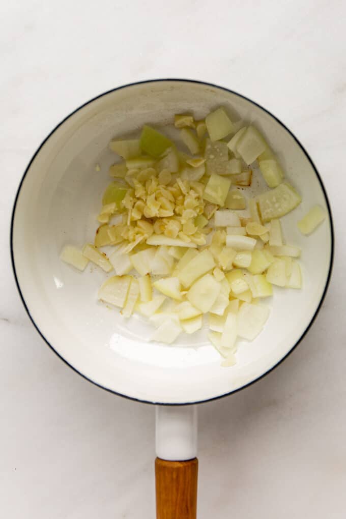 garlic and onion in a white pot