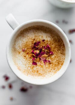 A chai latte in a white mug