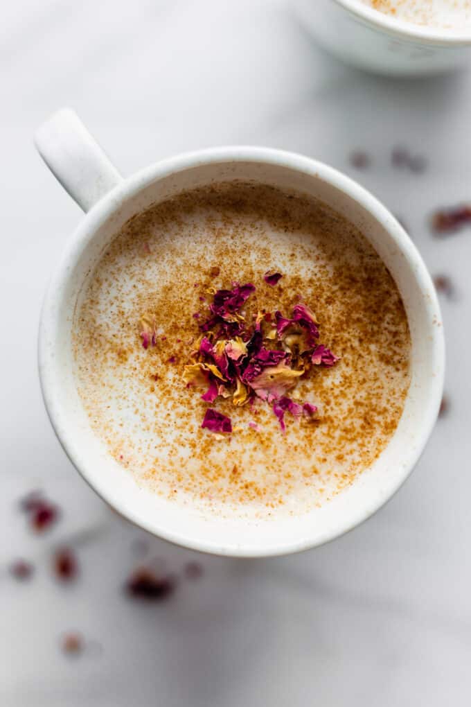 A chai latte in a white mug