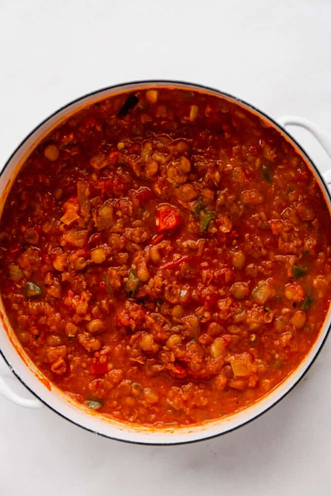 lentil chili in a white pot