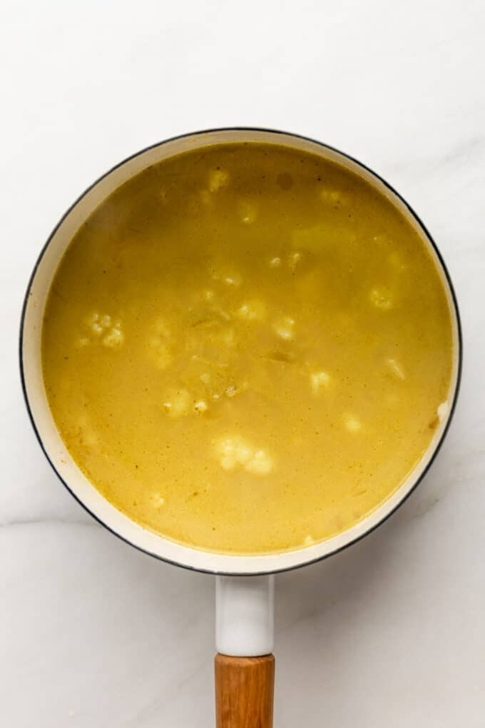 unblended cauliflower soup in a pot