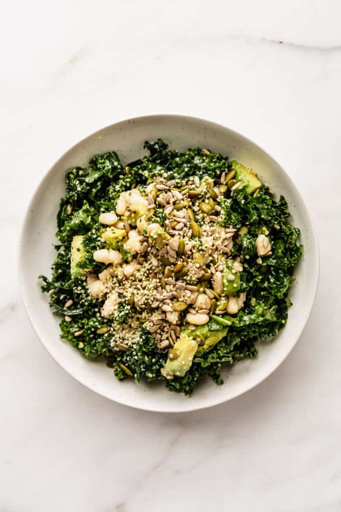 A bowl of kale and white bean salad