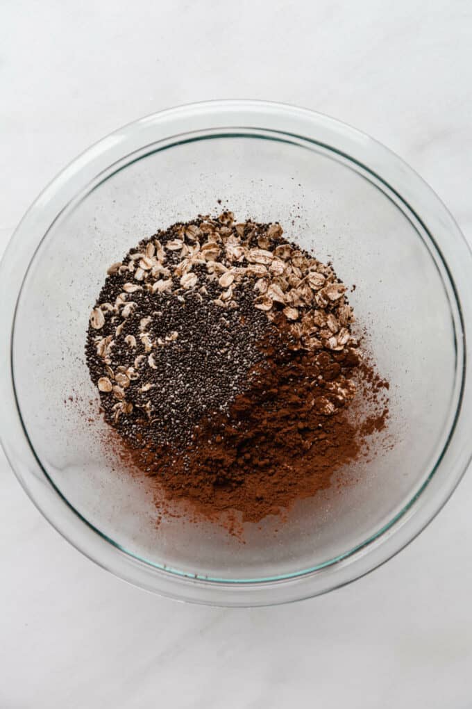 oats, chia seeds and cocoa powder in a bowl