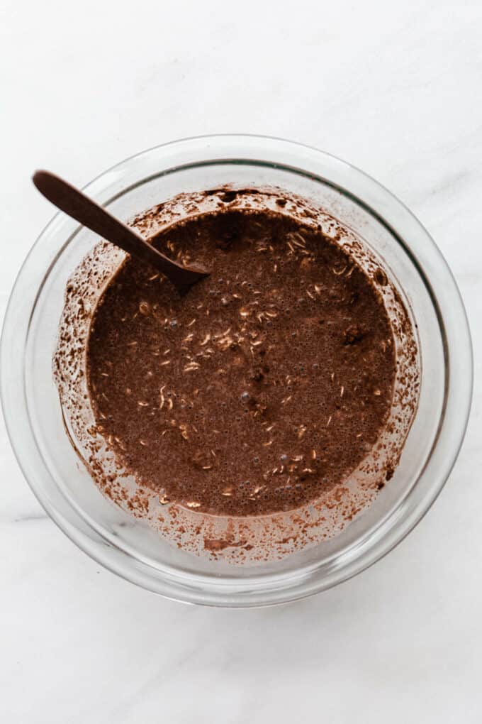 oats, cocoa powder and almond milk in a bowl