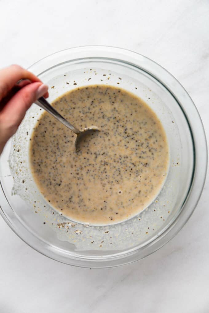 almond milk, chia seeds and peanut butter mixed together in a bowl