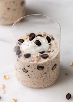 a cup of cookie dough overnight oats topped with chocolate chips