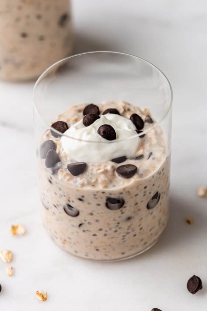 a cup of cookie dough overnight oats topped with chocolate chips