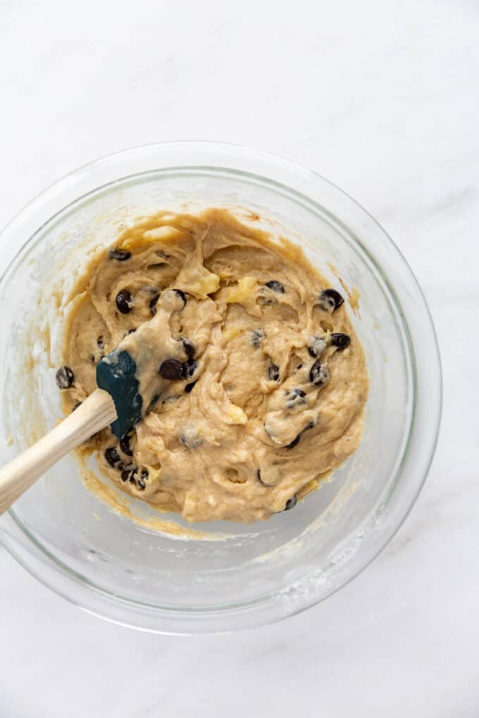 banana muffin batter mixed with chocolate chips