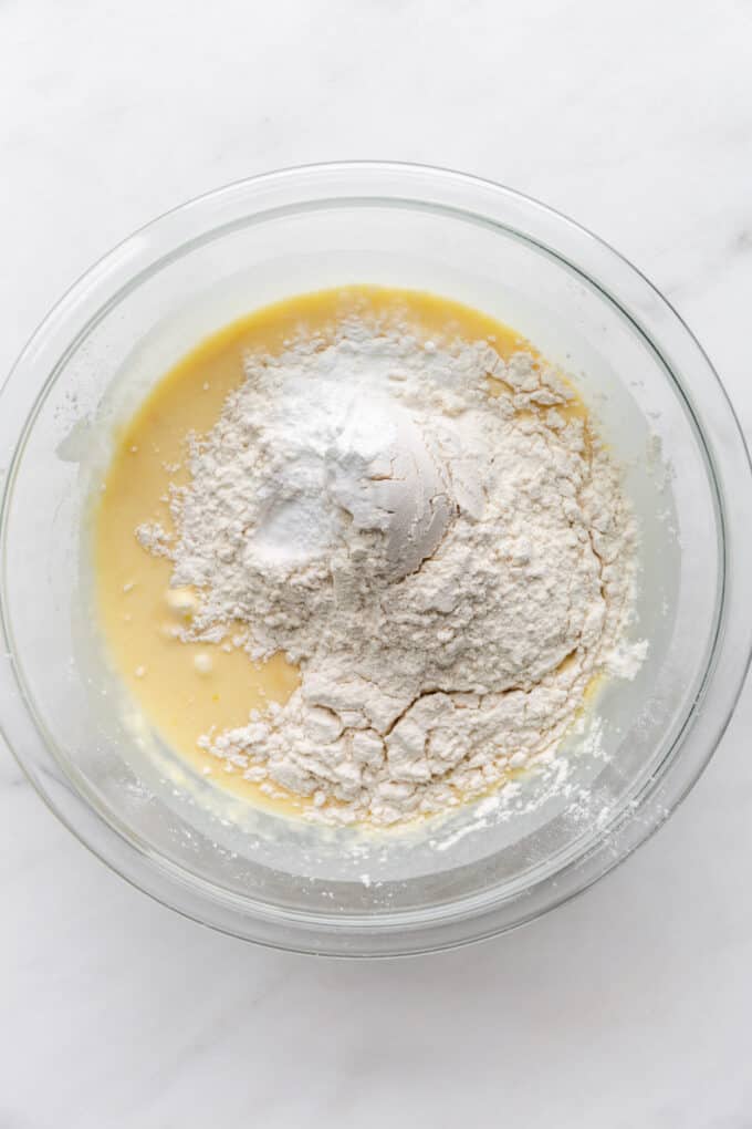 flour, eggs and yogurt in a mixing bowl