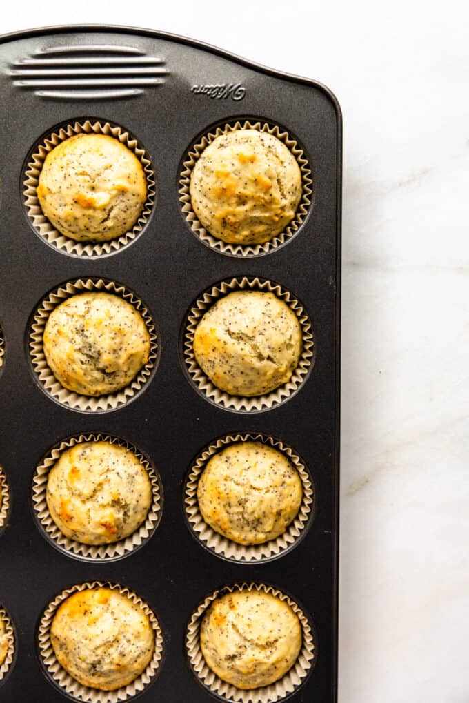 lemon poppyseed muffins in a muffin pan