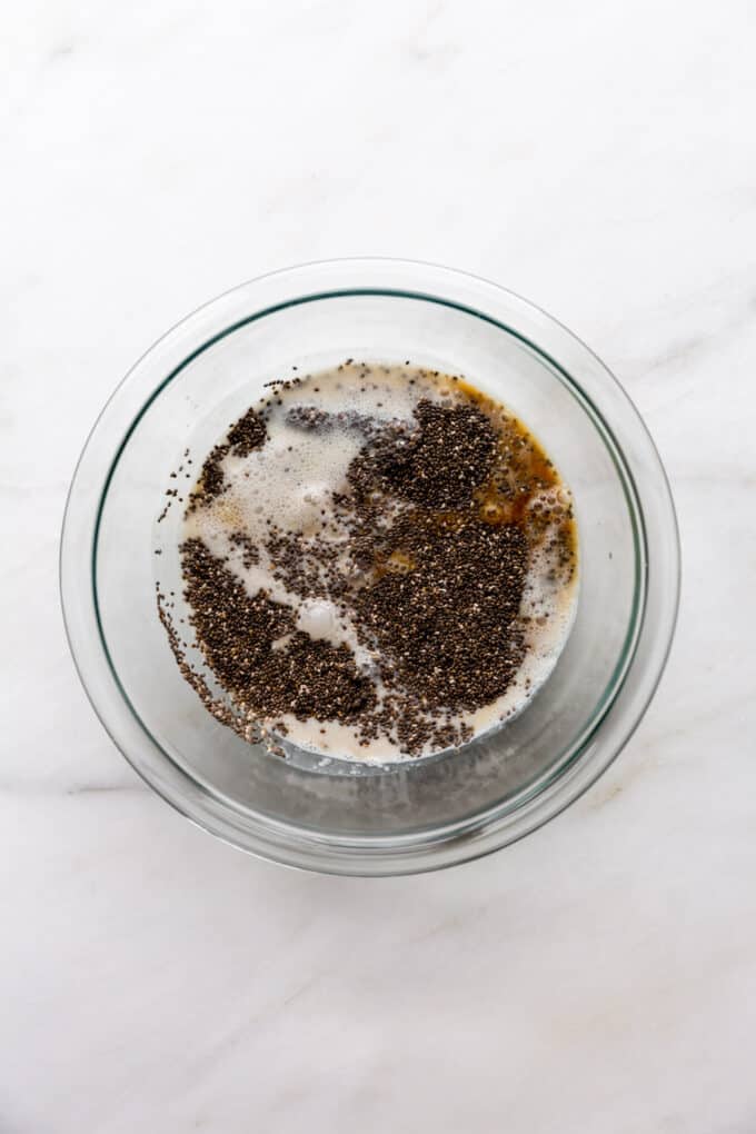 chia seeds, coconut milk and coffee in a mixing bowl