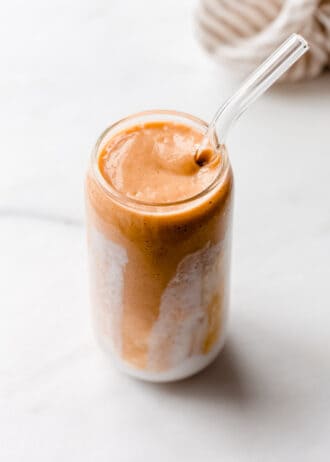 a papaya smoothie on a marble counter