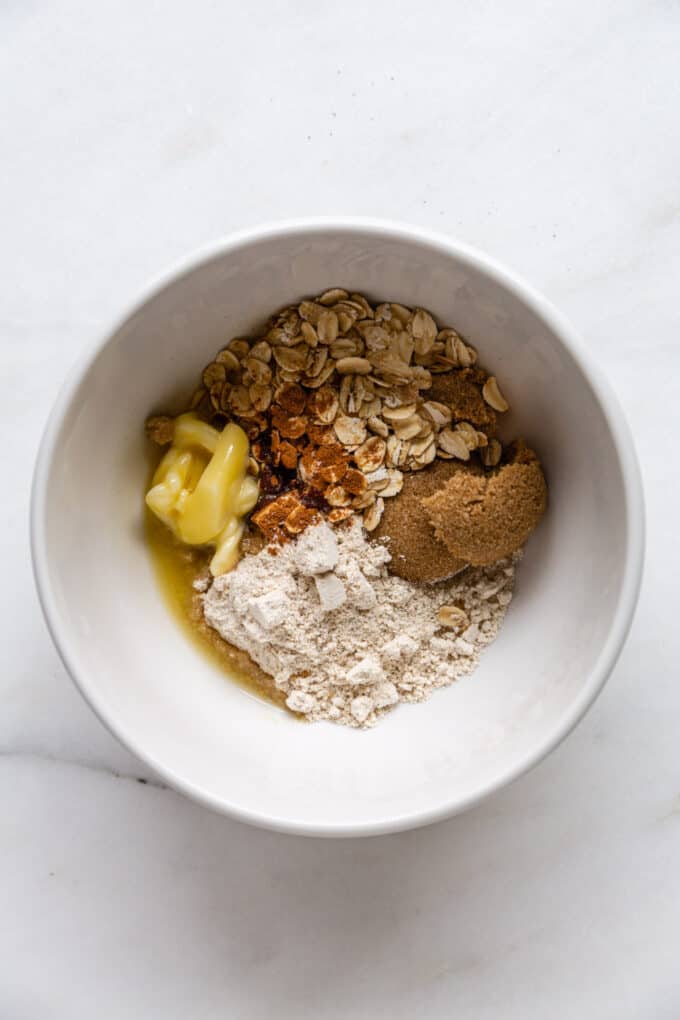 oats, brown sugar, oat flour and butter in a bowl