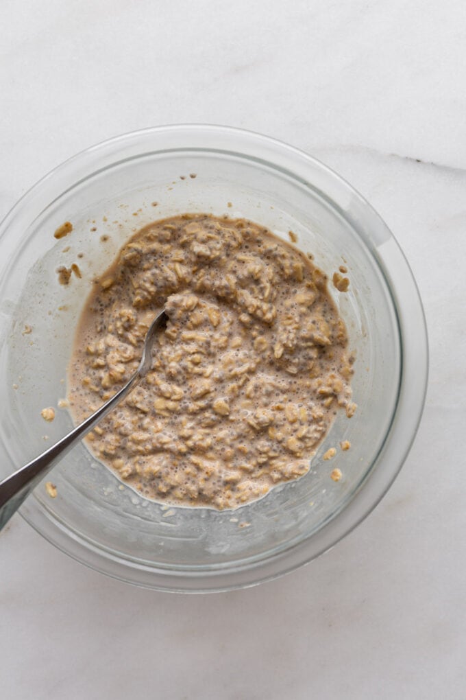 cinnamon roll overnight oats in a bowl