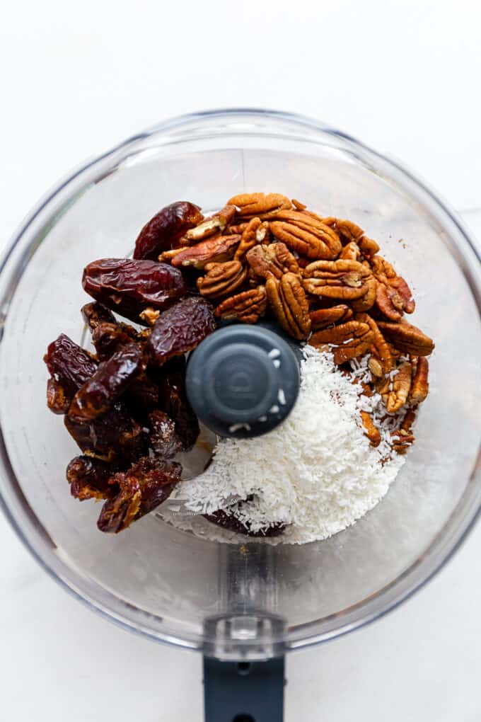 dates, pecans and shredded coconut in a food processor